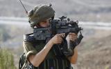 an-israeli-soldier-aims-his-gun-at-unarmed-palesti-1445515494211.jpg