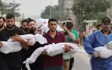 palestinian-men-carry-civilians-including-children-wrapped-in-white-cloths-killed-by-israeli-attacks-on-gaza.webp