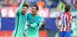 Lionel-Messi-of-FC-Barcelona-celebrates-with-Neymar