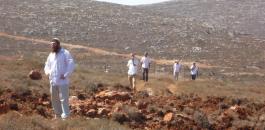 settlers-entering-the-palestinian-land-in-qusra-one-man-is-armed