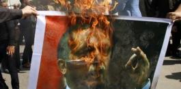 حرق صور اردوغان في ادلب 