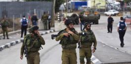 israeli-soldiers-walk-formation-while-patrol