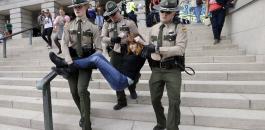 اعتقال متظاهرين امريكيين 