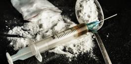 bigstock-Drug-Syringe-And-Cooked-Heroin-76081889