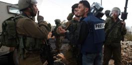 palestinian-journalist-with-israeli-soldiers