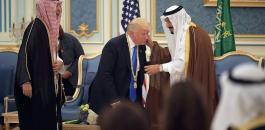 الملك سلمان يقلد ترمب أرفع وسام سعودي