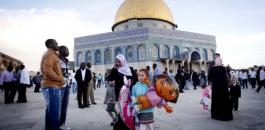 Thousands-of-Muslim-worshippers-arrive-to-Eid-prayers-at-the-al-Aqsa-Mosque-in-Jerusalem-on-the-first-day-of-the-muslim-holiday-of-Eid-al-Adha-618x412