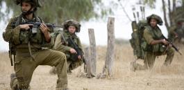 1406045616131_Image_galleryImage_Israeli_soldiers_kneel_du