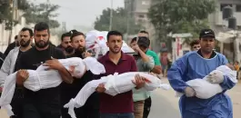 palestinian-men-carry-civilians-including-children-wrapped-in-white-cloths-killed-by-israeli-attacks-on-gaza.webp