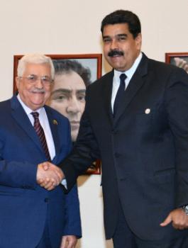 عباس والرئيس الفنزولي 
