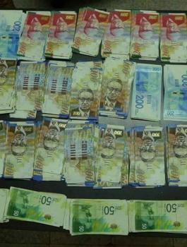 ضبط معمل لتزوير العملات في طولكم 