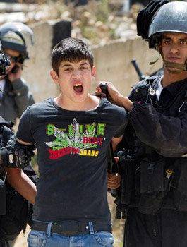 Palestinian-youth-arrested-by-Israeli-soldiers-in-Beit-Hanina