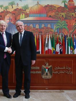 المالكي ووزير الخارجية البريطاني