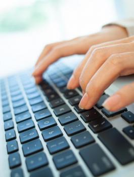 woman-typing-on-a-computer-keyboard