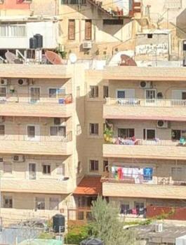 الاستيلاء على بناية سكنية في بطن الهوى بسلوان 