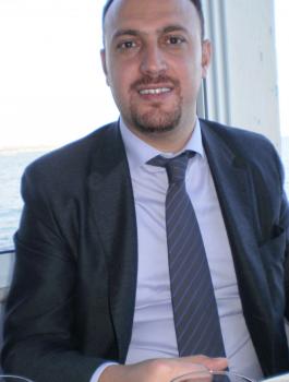 مستشار الرئيس حسام زملط