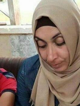 والدة الشهيد ابو غنام 