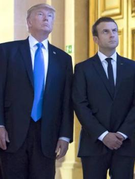 ترامب وزوجة الرئيس الفرنسي 
