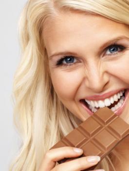 woman-eating-chocolate-bar