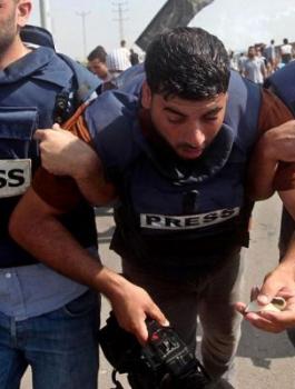 اصابة صحفيين ومسعفين في  غزة  