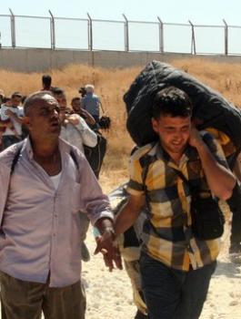 سوريون يعودون إلى بلادهم