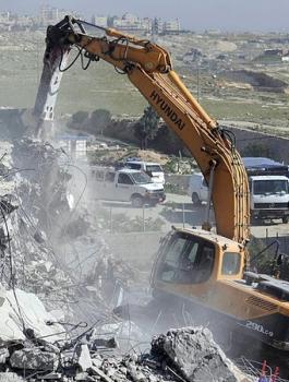 هدم منازل شهداء دير ابو مشعل 