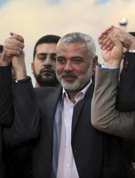 حماس وهنية وعزام الأحمد 