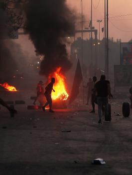 اعتقال متظاهرين في العراق 