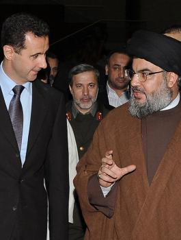 نصر الله تنكر على هيئة رجل أعمال للقاء الأسد