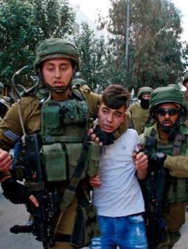 اعتقال وغرامات على اطفال فلسطينيين 