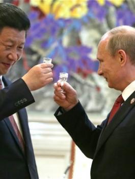 الرئيس الصيني والرئيس الروسي والدولار 