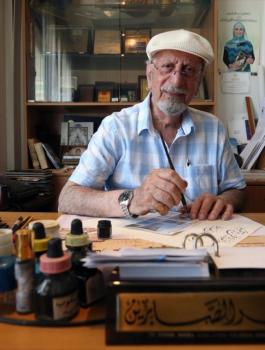 لبناني يكتب القرأن بخط لم يسبق اليه احد 