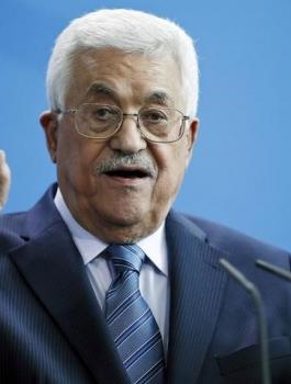 عباس وميركل 