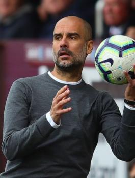 مدير مانشستر سيتي وبرشلونة 