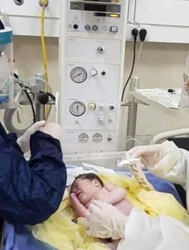 اول عملية قيصرية  لام مصابة بكورونا 