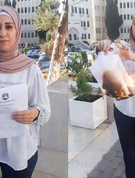 معلمة تحرق شهادتها في رام الله 