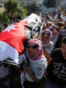 آلاف الأردنيين يشيعون جثمان الشهيد الجواودة