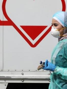 jordan-coronavirus-nurse-heart-RTS37P1U-HiRes.jpg