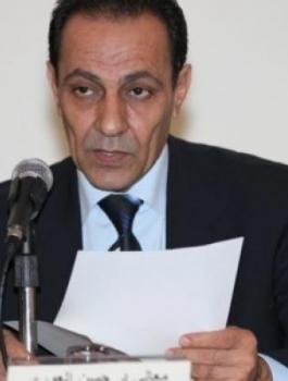 المستشار القانوني للرئيس عباس حسن العوري