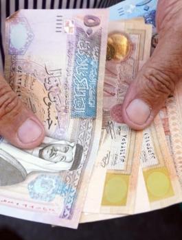 الدولار والدينار الامريكي