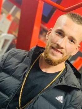 قتيل في مخيم شعفاط