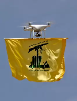 231020_hezbollah_flag_drone_GettyImages-1256872800-scaled-e1697823083767.webp