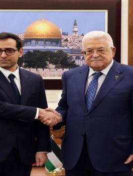 عباس ووزير خارجية فرنسا