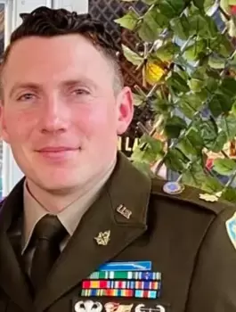 Army-officer-Maj.-Harrison-Mann.webp