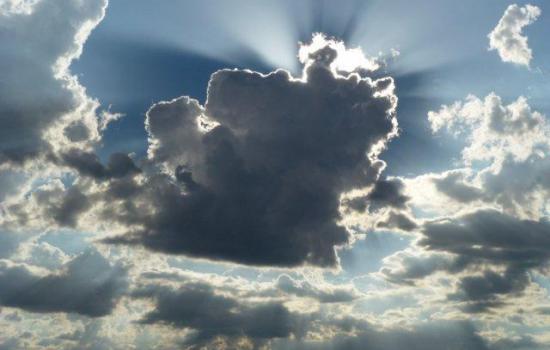 Setting-sun-behind-rain-cloud.gallery