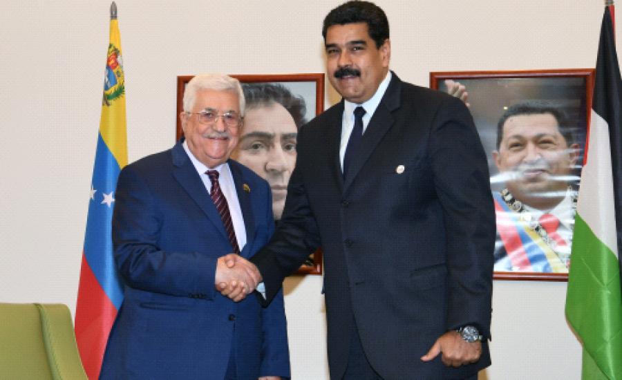 عباس والرئيس الفنزولي 