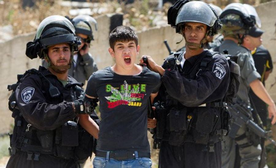 Palestinian-youth-arrested-by-Israeli-soldiers-in-Beit-Hanina