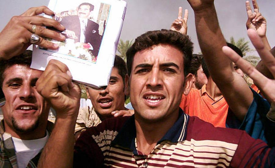رفع صور صدام حسين في العراق 