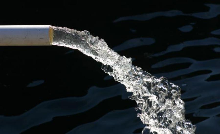 close-up-of-water-pipe-with-pouring-water-184935202