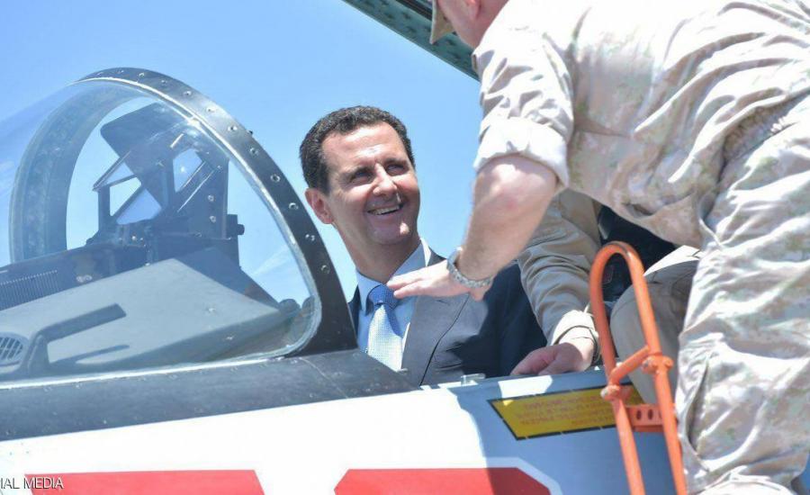 بالصور .. الأسد لأول مرة يزور القاعدة الروسية ويتفقد معدات الحرب بنفسه